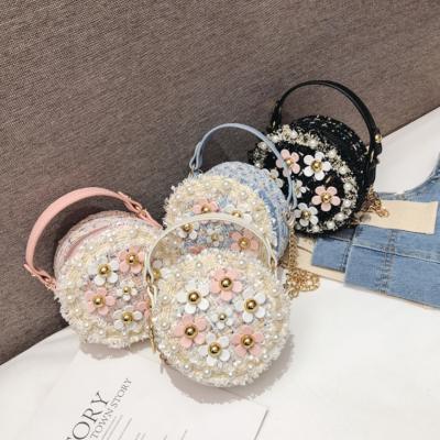 China Fashion New Fashionable Children's Single Shoulder Small Cross Bag - Body Bag Mini Round Bag Flower Handbag for sale