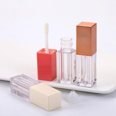 China Raw hot sale white transparent empty lip gloss tube with different brushes for sale