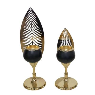 China Religious Activities Nordic Idea Metal Crafts Home Decoration Hotel Wedding Props Leaves Black Retro Candlestick for sale