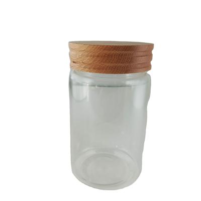 China Freshness Preservation Factory Selling Clear Glass Jar Honey Candle Glass Jar With Wooden Lids for sale