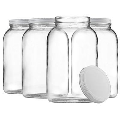 China Sustainable Wholesale Glass Jar Wide Mouth With Airtight Metal Lid For Storage Food for sale