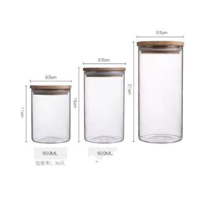 China Viable Wholesale Kitchen Glass Storage Jar Borosilicate Glass Bamboo Lid For Kitchen Use for sale