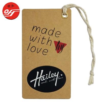 China Kraft Paper Silver Metal Eyelet Embossed Name Sustainable Printing Hang Tag With Hemp Rope for sale