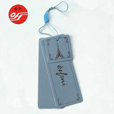 China Sustainable Fashion Brand Design Laser Cut Custom Hang Tags For Handbags for sale