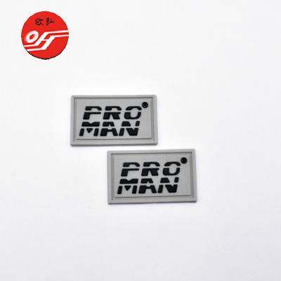 China High Quality Custom Sewing Patch Viable OEM Silicon 3D Logo Embossed Tag For Garment for sale