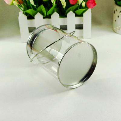 China Custom Recyclable Tin Handle Plastic Pvc Clear Round Tin Box T-Shirt for sale