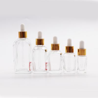 China 15ml 20ml 30ml 40ml Square Essential Oil Cosmetic Transparent Glass Dropper Bottle White Lid for sale