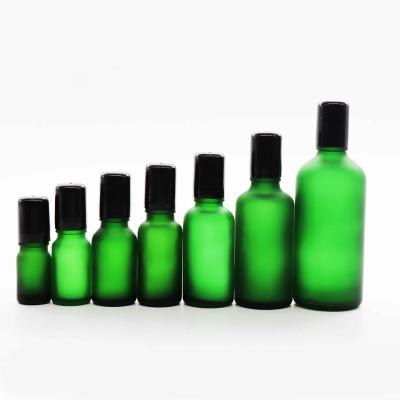 China Wholesale Cosmetic Matte Frosted Green Glass Dropper Bottle With Roll Cap 30ml 50ml 100ml for sale