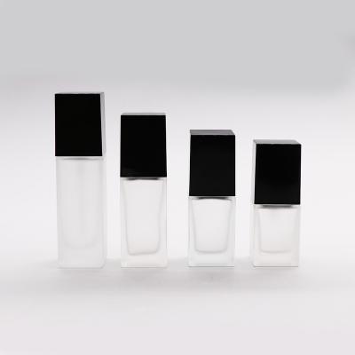 China 15/20/30/40ml cosmetic frosted glass clear square lotion base pump bottle for sale