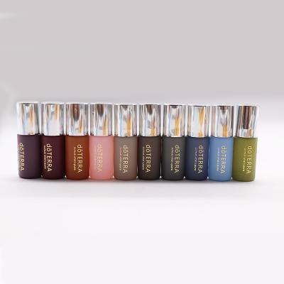 China 5ml 10ml Gemstone cosmetic empty glass roller pastel bottle with gold foil cap for sale