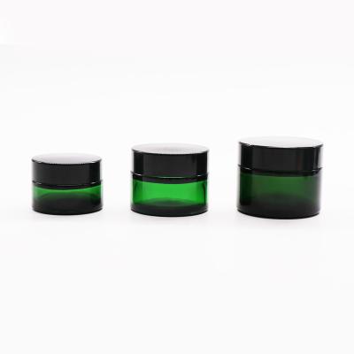 China Wholesale 10g 30g 50g Cosmetic Green Glass Cream Jar With Lid for sale