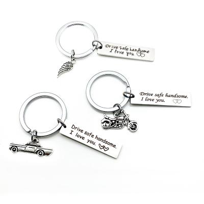 China Classic DIY Stainless Steel Key Chain Drive Safe I Need You Here With Me Safe Driving Charm Bag Key Chain Pendant for sale