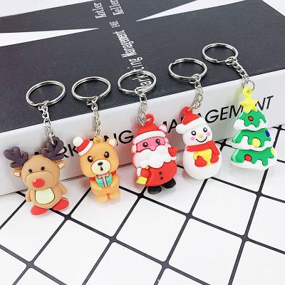 China New Creative Soft Glue Santa Claus, Snowman, Elk Buckle Little Girl Car Bag Key Key Dangle Holiday PVC Gift for sale