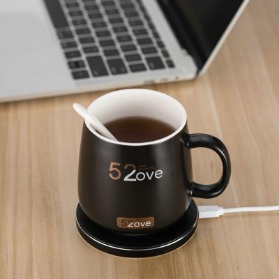 China New Viable Smart Radio Charging Cup Thermostat Hot Mug 55 Degree Heating Coaster Creative Mobile Phone Wireless Charger for sale