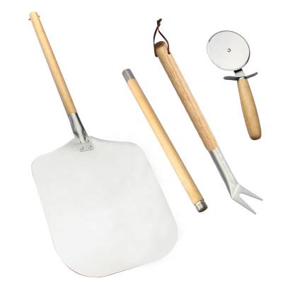 China Viable Amazon pizza tool kit detachable rubber wooden handle pizza peel aluminum pizza shovel and pizza fork for sale