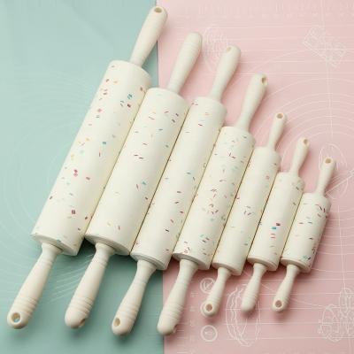 China Color Viable Particles Non-Stick Silicone Pins With Plastic Handle Pastry Tools For Kids for sale