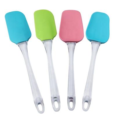 China Sustainable Promotional Gifts Non Stick Silicone Spatulas , Kitchen Cooking Silicon Spatula With Plastic Handle for sale