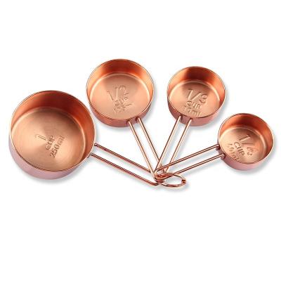 China Sustainable Kitchen Instrument 4 Piece Rose Gold Stainless Steel Baking Measuring Cups With Scale for sale