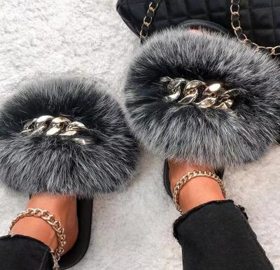 China Raccoon fur slippers sandals furry slides furry women's sandals big real fur high quality flat sandals with chain 004 for sale