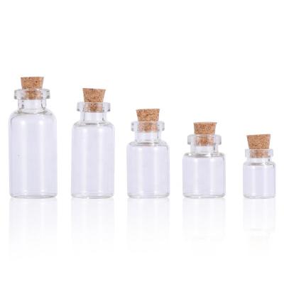 China 0.5ml Empty Cosmetic 1ml 2ml 3ml 5ml Mini Small Glass Bottle with Cork Top for sale