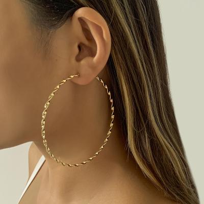 China Metal Circle Earrings Female Personalized Geometric Cool Temperament CLASSIC Exaggerated Winding Earrings for sale