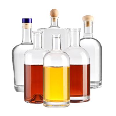 China Wholesale Custom Empty Beverage Liquor Bottle Vodka Junk Glass Bottle 375ml 500ml 700ml 750ml 1000ml With Cork Juniper Glass Bottle Factory for sale