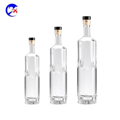 China New Unique Design 680ml Beverage Glass Wine Bottle With Cork Weight Whiskey Bottle Custom Liquor Bottle for sale