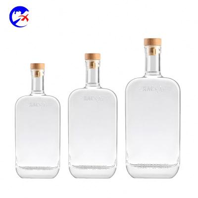 China Unique Beverage 16oz Glass Bottle 50cl 500ml Clear Wine Shape Liquor Bottle With Cork Logo Custom Bottle for sale