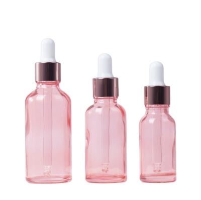 China Personal Packaging Luxury Hat 5ml 10ml 15ml 30ml Rose Gold Glass Bottle Skin Care Dropper For Essential Oil for sale