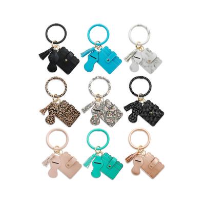 China Multicolor Printing Leather Key Chain Wristband Key Ring PU ID Card Holder Tassel Wristband Key Ring Around Wristband Wristband Key Chain with Charpstick Holder for sale