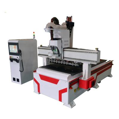 China Building Material Shops Automatic CNC ROUTER WOODWORKING MACHINE 1325ATC Tool Change Wood CNC Router For Wood Cabinet Door for sale