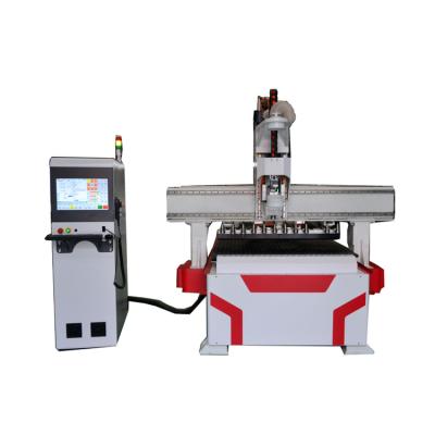 China Building Material Shops Automatic CNC ROUTER WOODWORKING MACHINE 1325ATC Tool Change Wood CNC Router For Wood Cabinet Door for sale