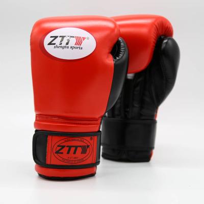 China ZTTY Best Adult Factory Professional Boxing Muttahida Majlis-e-Amal Gloves Muay Weight Training Thai Boxing Gloves for sale