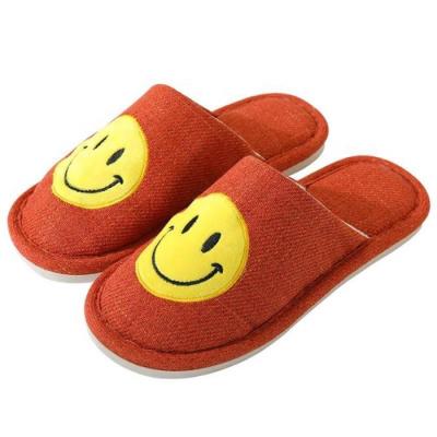 China Fashion trend face Four Seasons canvas slippers men's and women's couples cotton smile non-slip comfortable home shoes for sale