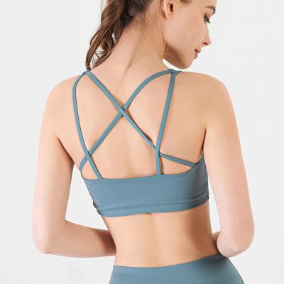 China Breathable thin section women's underwear sports shockproof working thin straps of the vest cross the back beautiful fitness yoga bra for sale