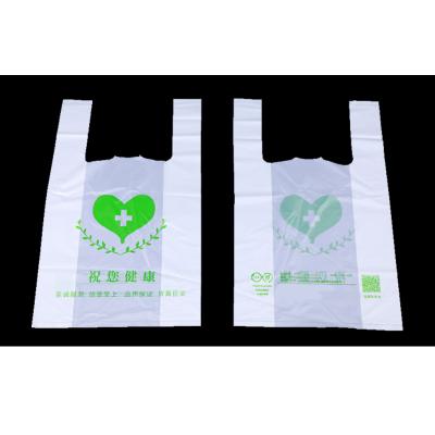 China Private Labels Supermarket White Biodegradable Pharmacy Vest Handle BIODEGRADABLE Customized Plastic Shopping Bag for sale