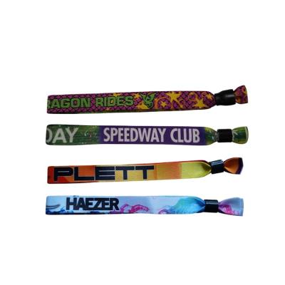 China All Promotional Adjustable Plastic People Clip Custom Fabric Woven Wristband Festival Wristband Event Party Wristband for sale