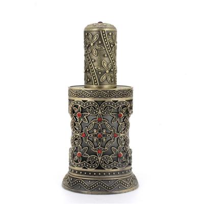 China Care MUB 40ml alloy metal oil personal luxury perfume bottle, Arabic style bronze spray perfume bottle for sale