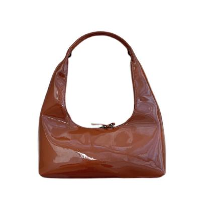 China 2022 New Retro Design Japanese Korean All-match Niche Bags Fashion Ladies Armpit Bag Bright Leather Shoulder Handbag for sale