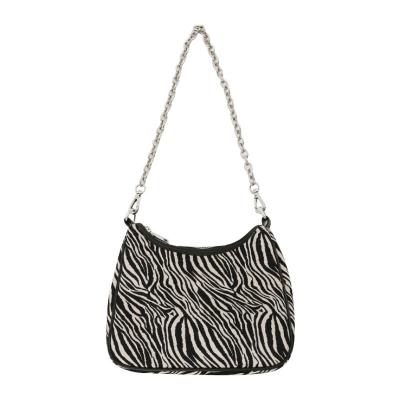 China Other niche design personality zebra pattern bags 2022 fashionable new brand women's retro fashion shoulder bag chain armpit bag for sale