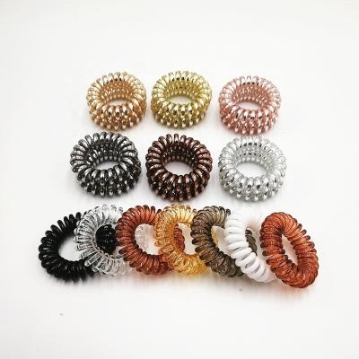 China Original Wholesale Original Wholesale Metallic Spiral Ties Strong Elastic Hair Grip Coil TPU Hair Ring Telephone Wiring Toggles Traceless Elastic Hair Accessories for sale