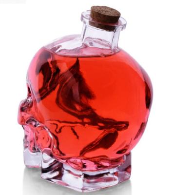 China 100ml 180ml 380ml 750ml Beverage Skull Glass Bottle Whiskey Skull Bottle Skull Glass Bottle for sale