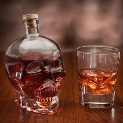 China 120ml 180ml 400ml 750ml Beverage Skull Glass Bottle Whiskey Skull Bottle Glass Skull Bottle for sale