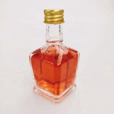 China 50ml Empty Square Shape Food Grade Glass Beverage Bottle With Screw Cap Lid For Storing Beverage Wine, Vodka for sale