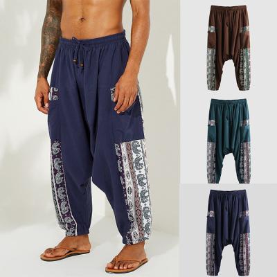 China Anti-wrinkle fashion harem pants loose national style printing casual loose drawstring waist men harem pants for sale