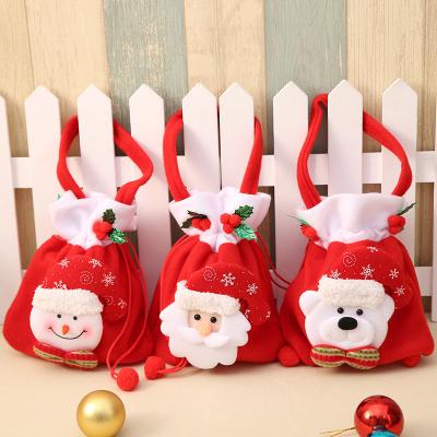 China LOW MOQ Santa Candy Flannelette Handbag Christmas Gift Bag Decorations Gift for sale