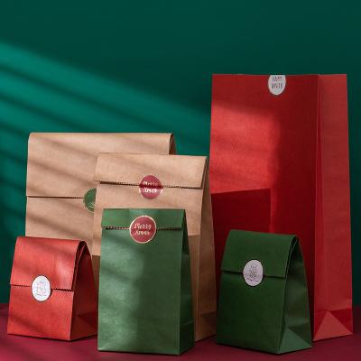 China Handmade Custom 125GSM Kraft Christmas Gift Paper Bag for sale