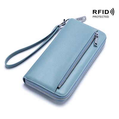 China Latest RFID Womens Wallets Women Travel Rfid Wallet Zipper Purse Phone Holder Stylish Genuine Leather Wallet Long for sale