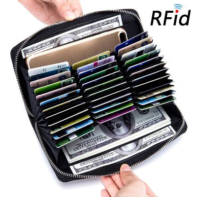 China Normcore/Minimalist RFID Blocking Pure Leather Multifunctional Zipper Stand Zipper Large Capacity Minimalist Wallet Women for sale