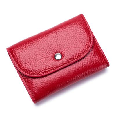 China Vintage Genuine Leather Coin Clips Cute Small Change Money Bags Wallets Case Mini Pouch For Girls Small Purses for sale